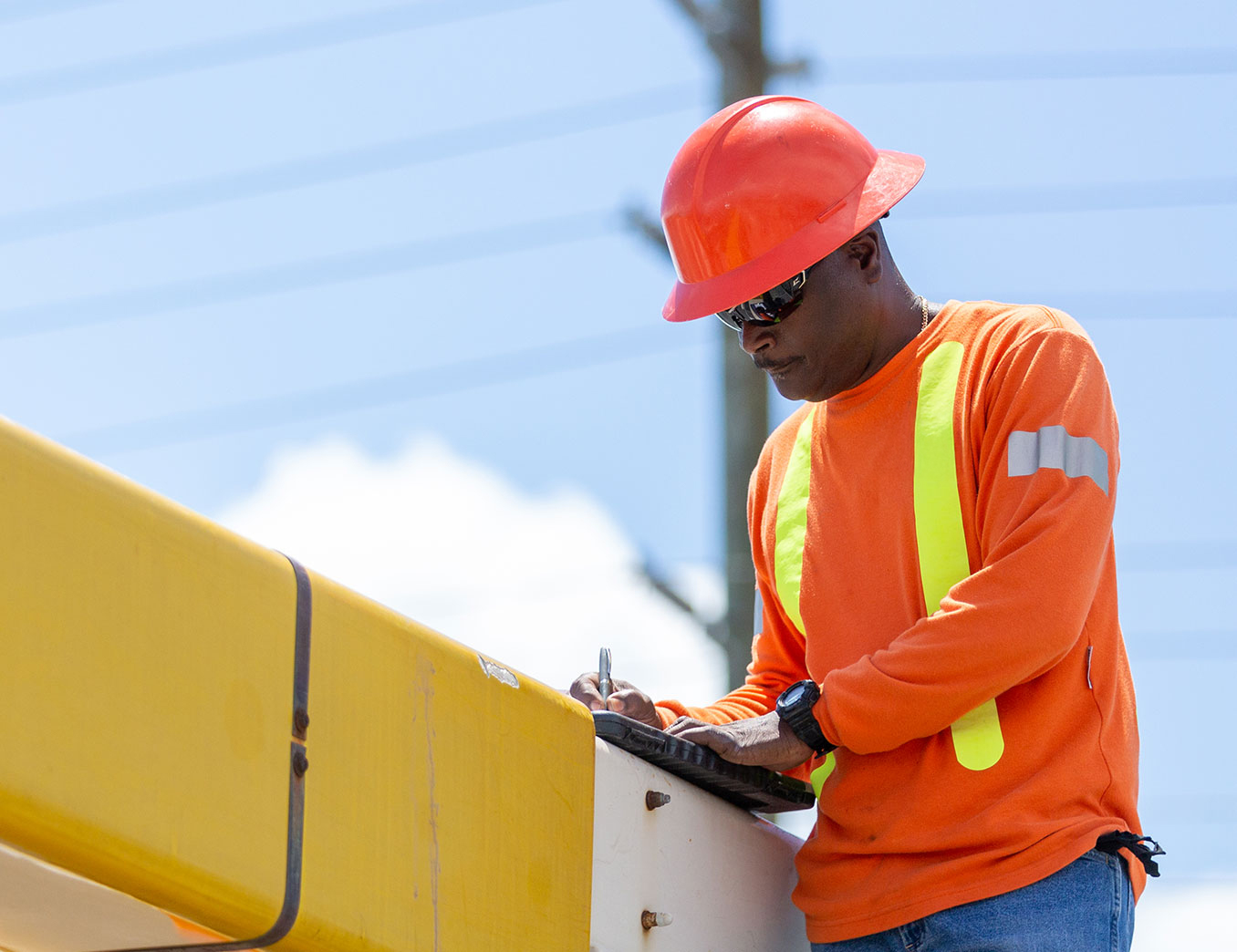 worker on site with tablet